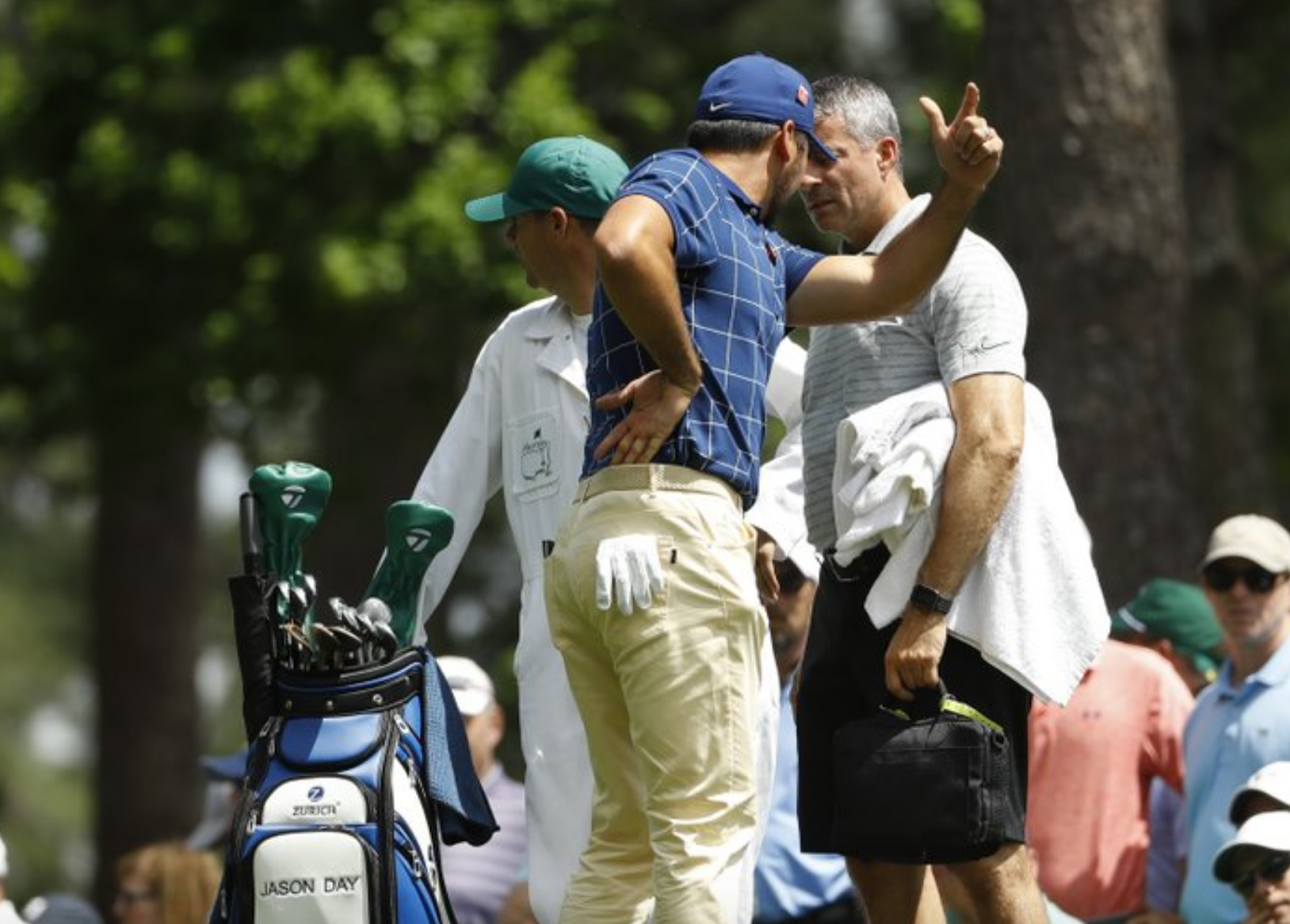 Injured while kissing daughter, Jason Day still tied for the lead at the Masters 